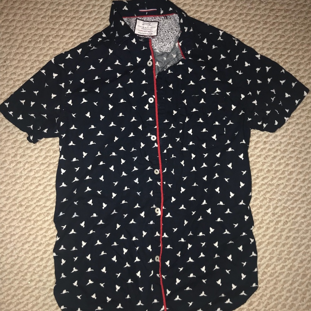 Button down shirt sleeve shirt